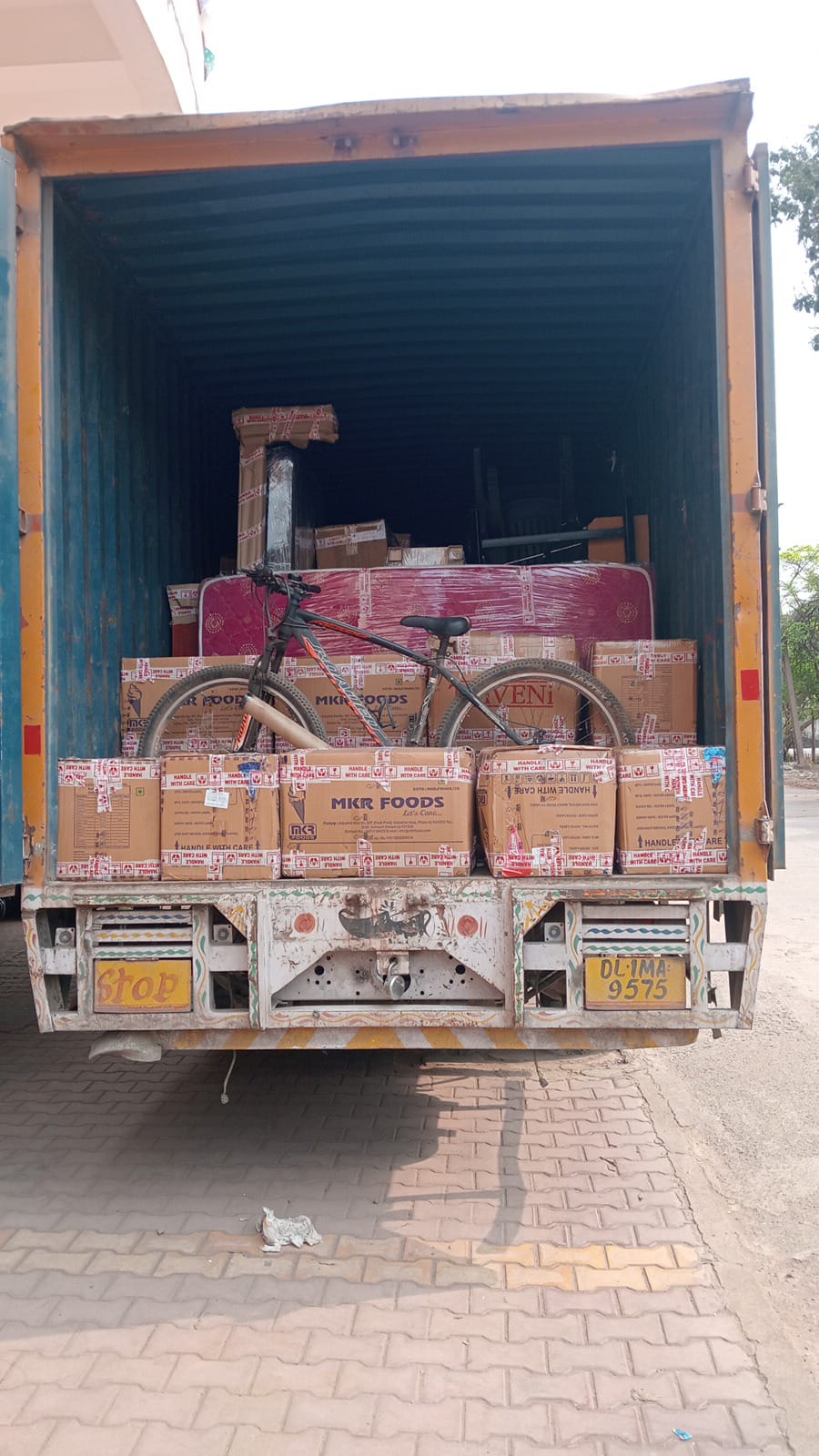 DTC International Packers Goods loaded in small vehicle